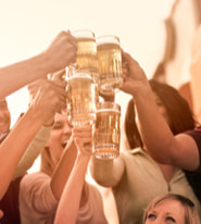 group toasting with beer