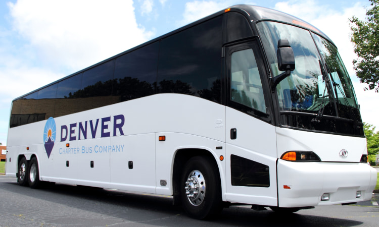 a charter bus with a Denver Charter Bus Company logo on the side